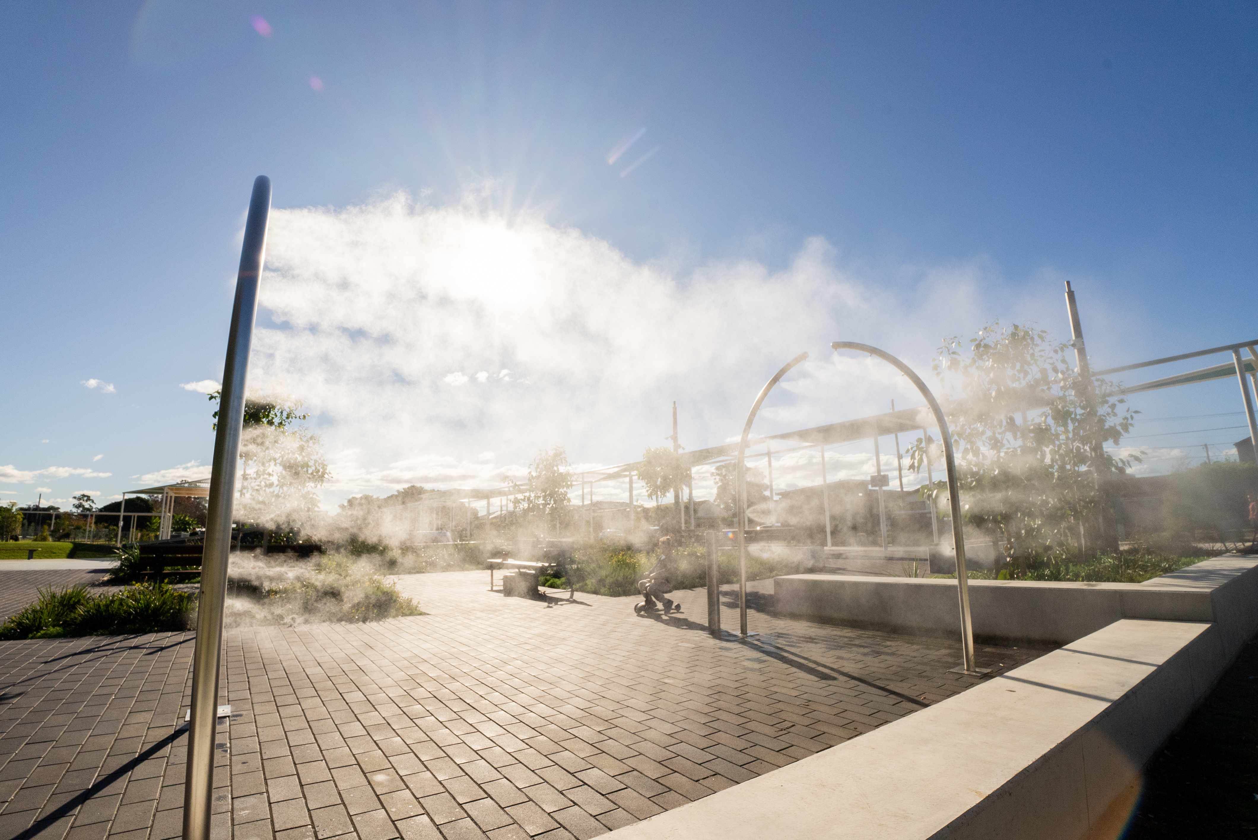 Urban heat island council misting public spaces