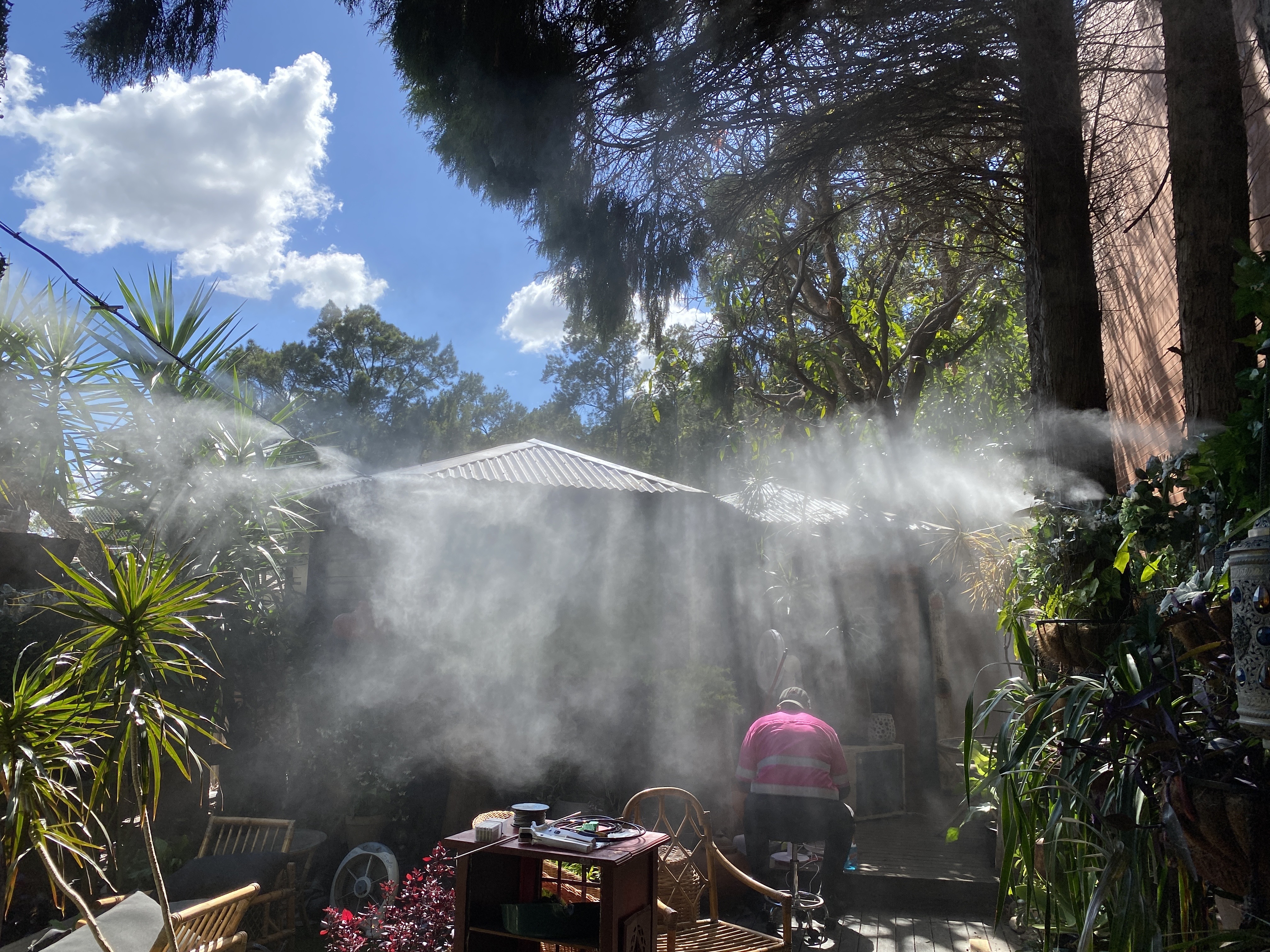 Fixed perimeter misting lines at garden venue