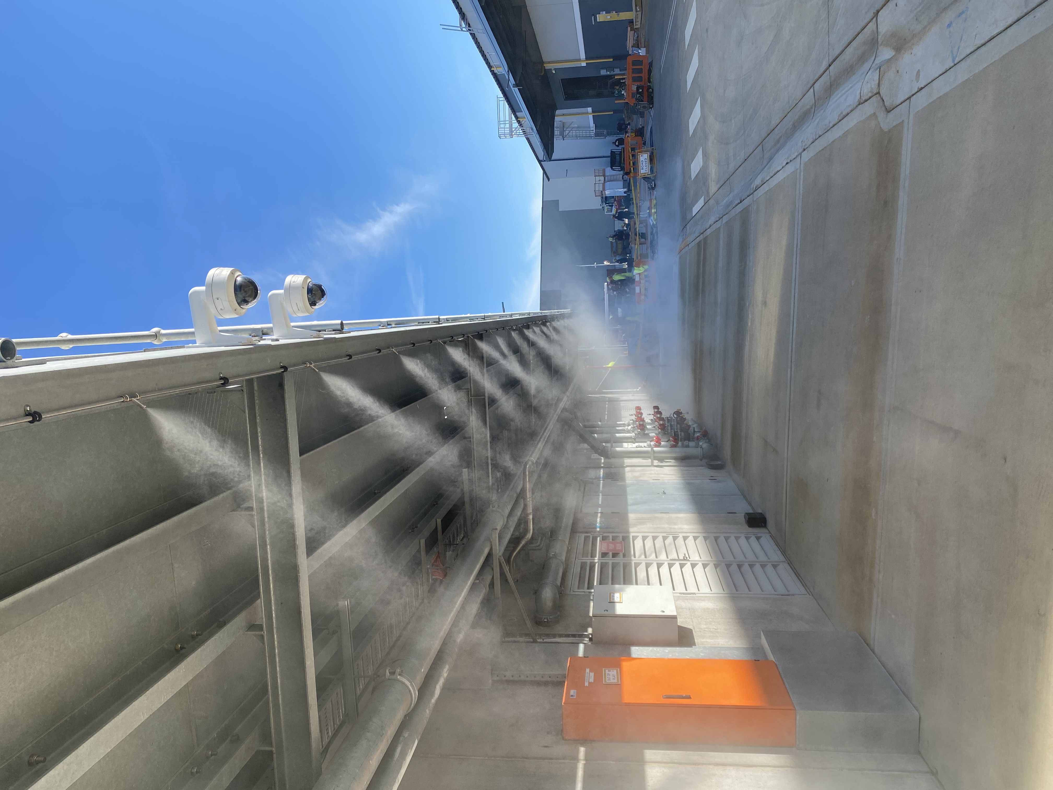 Fixed perimeter misting lines at outdoor dining area