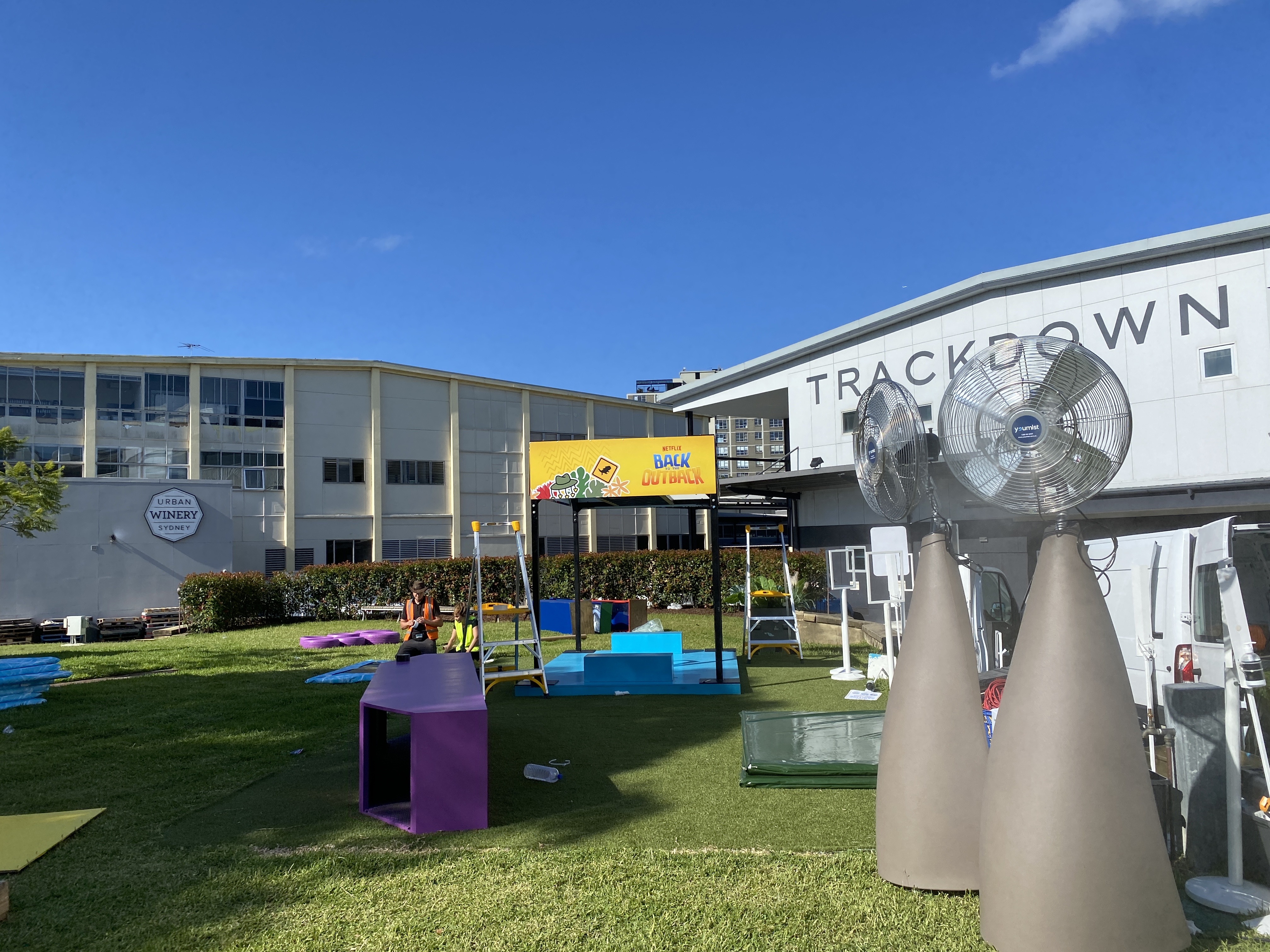 Misting fans at outdoor event setup